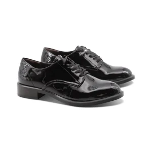 Stringata elegante nera lucida da donna