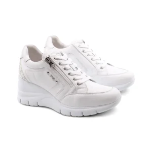 Sneaker zeppa in pelle con zip laterale